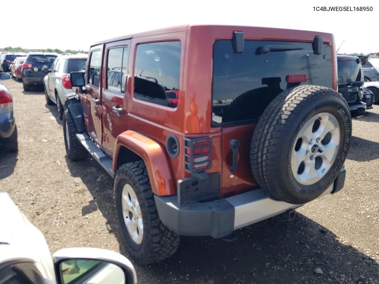 2014 Jeep Wrangler Unlimited Sahara VIN: 1C4BJWEG5EL168950 Lot: 61664074