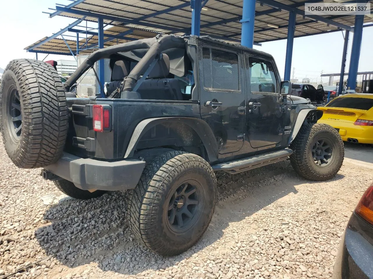 1C4BJWDG2EL121537 2014 Jeep Wrangler Unlimited Sport