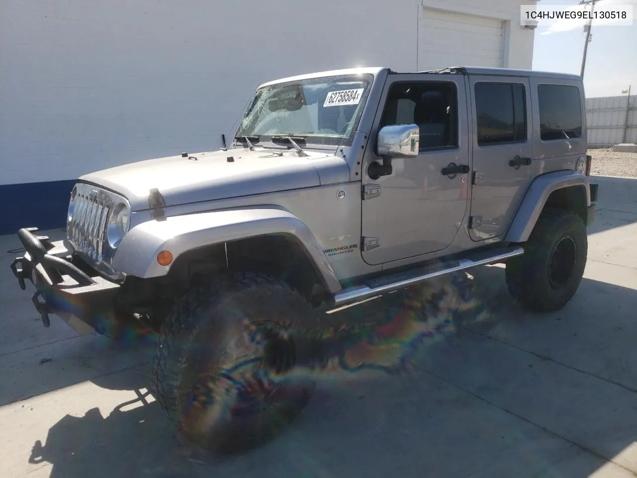 1C4HJWEG9EL130518 2014 Jeep Wrangler Unlimited Sahara