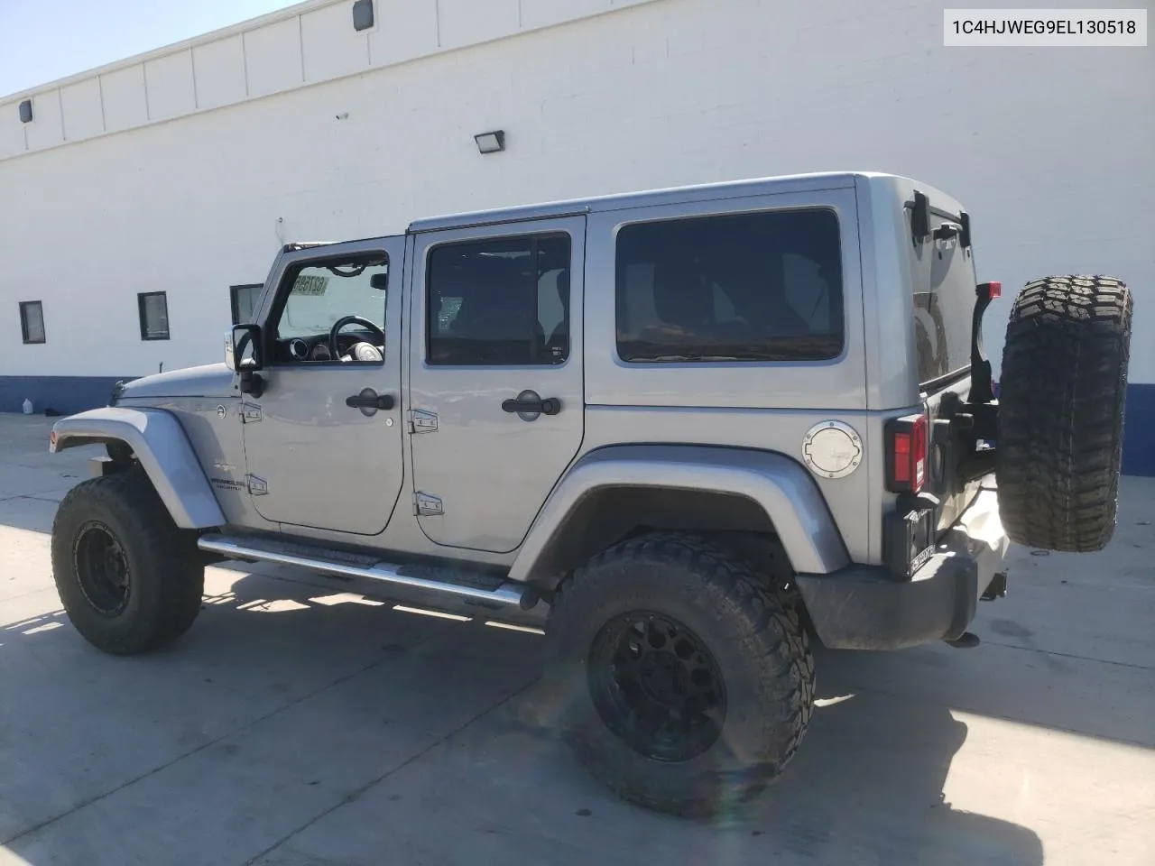 2014 Jeep Wrangler Unlimited Sahara VIN: 1C4HJWEG9EL130518 Lot: 62758584