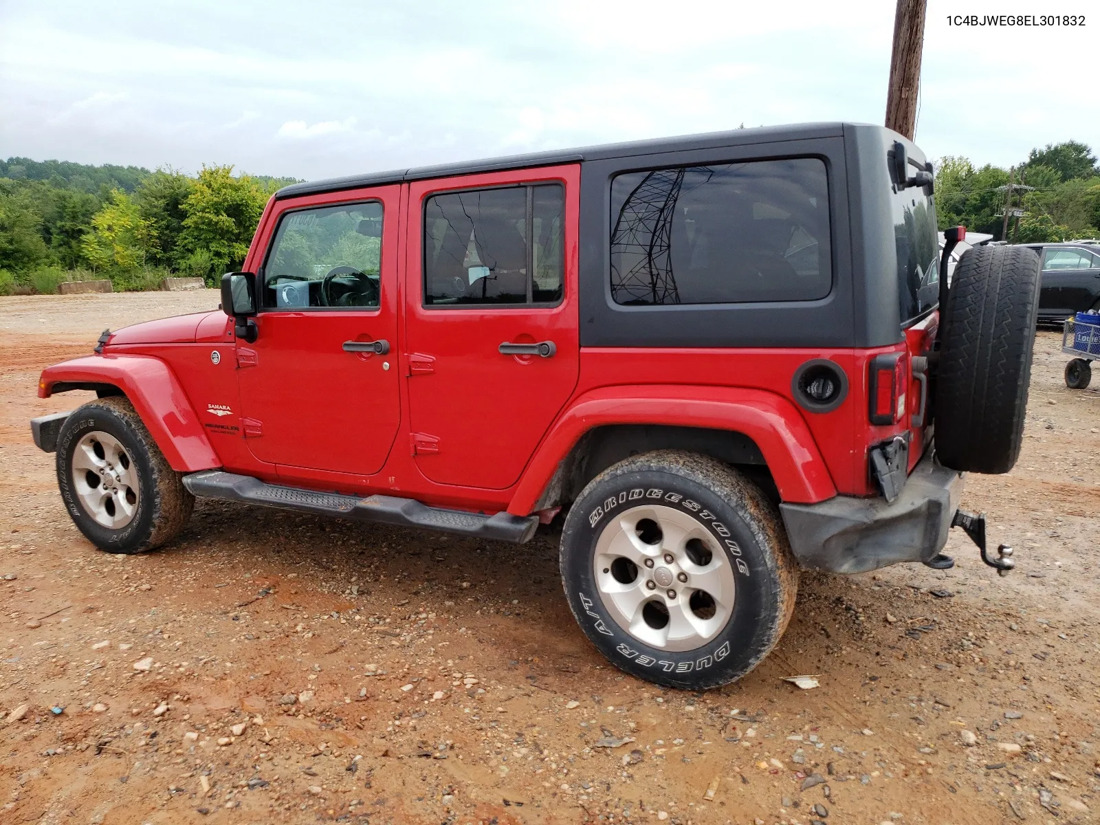 2014 Jeep Wrangler Unlimited Sahara VIN: 1C4BJWEG8EL301832 Lot: 63017894