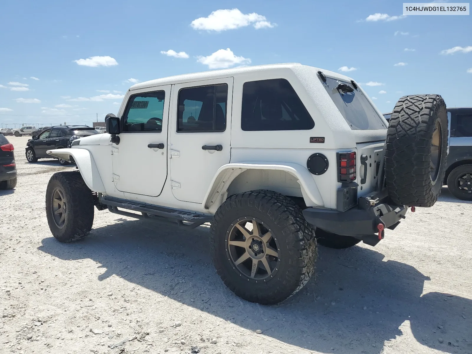 1C4HJWDG1EL132765 2014 Jeep Wrangler Unlimited Sport