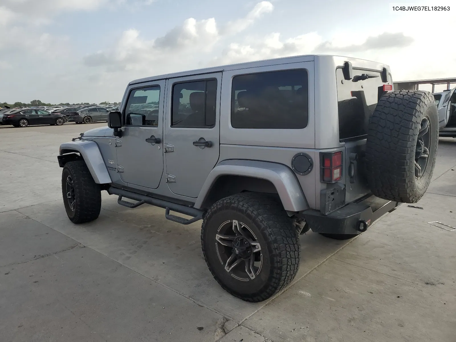 1C4BJWEG7EL182963 2014 Jeep Wrangler Unlimited Sahara