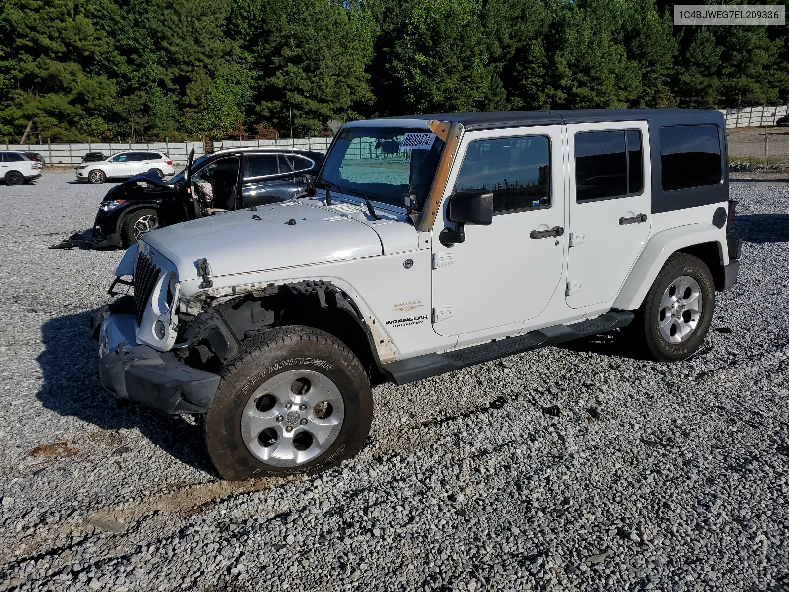 1C4BJWEG7EL209336 2014 Jeep Wrangler Unlimited Sahara