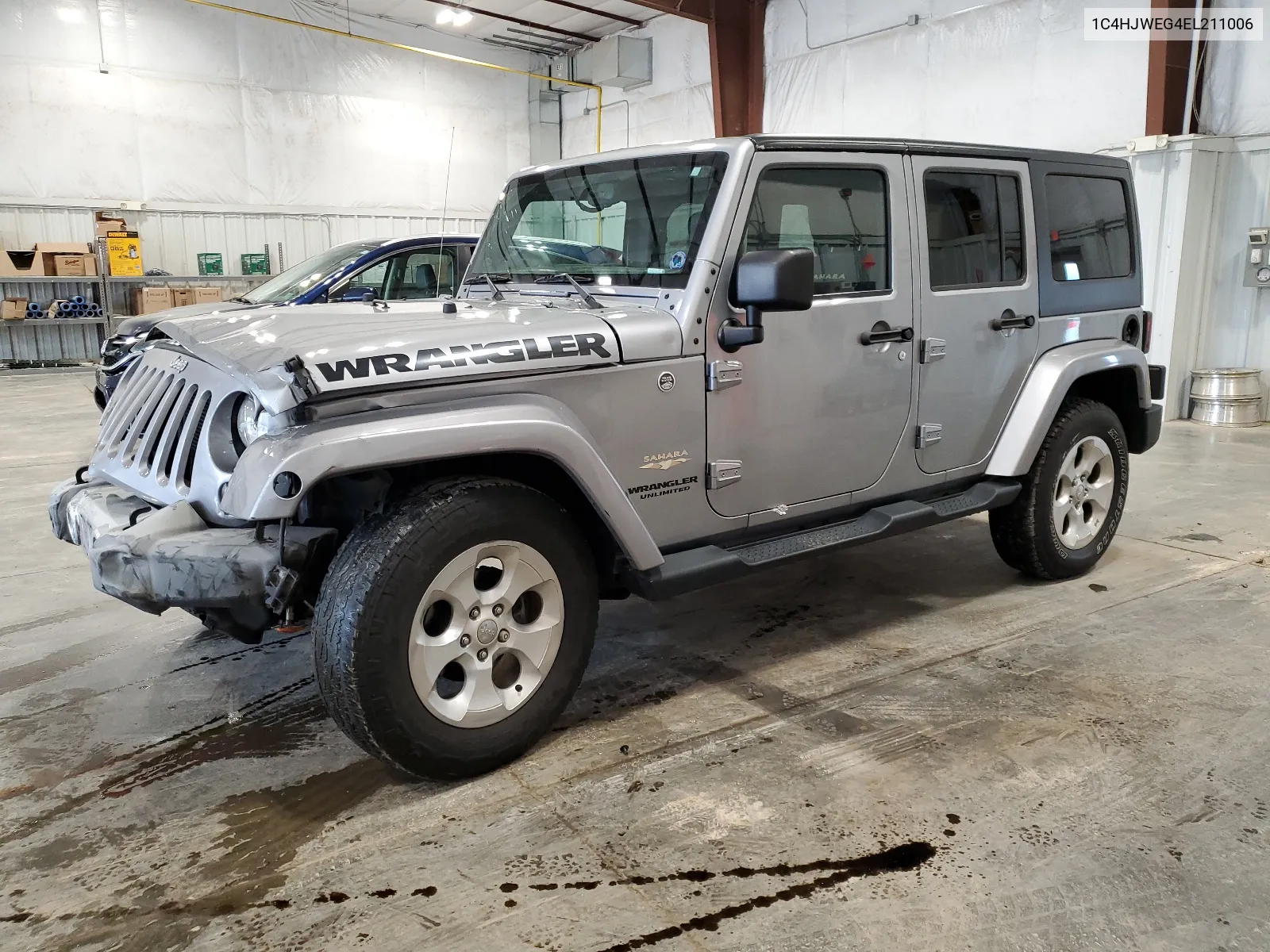 1C4HJWEG4EL211006 2014 Jeep Wrangler Unlimited Sahara