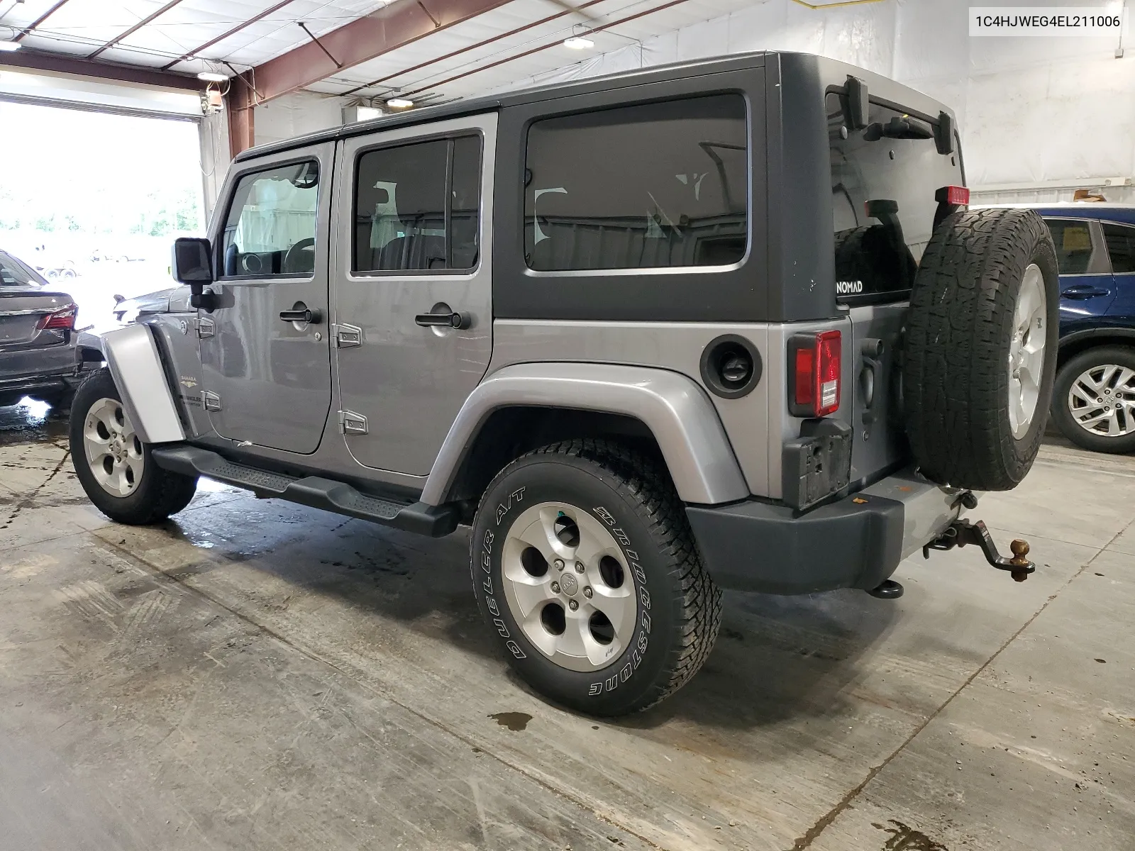 2014 Jeep Wrangler Unlimited Sahara VIN: 1C4HJWEG4EL211006 Lot: 66206124