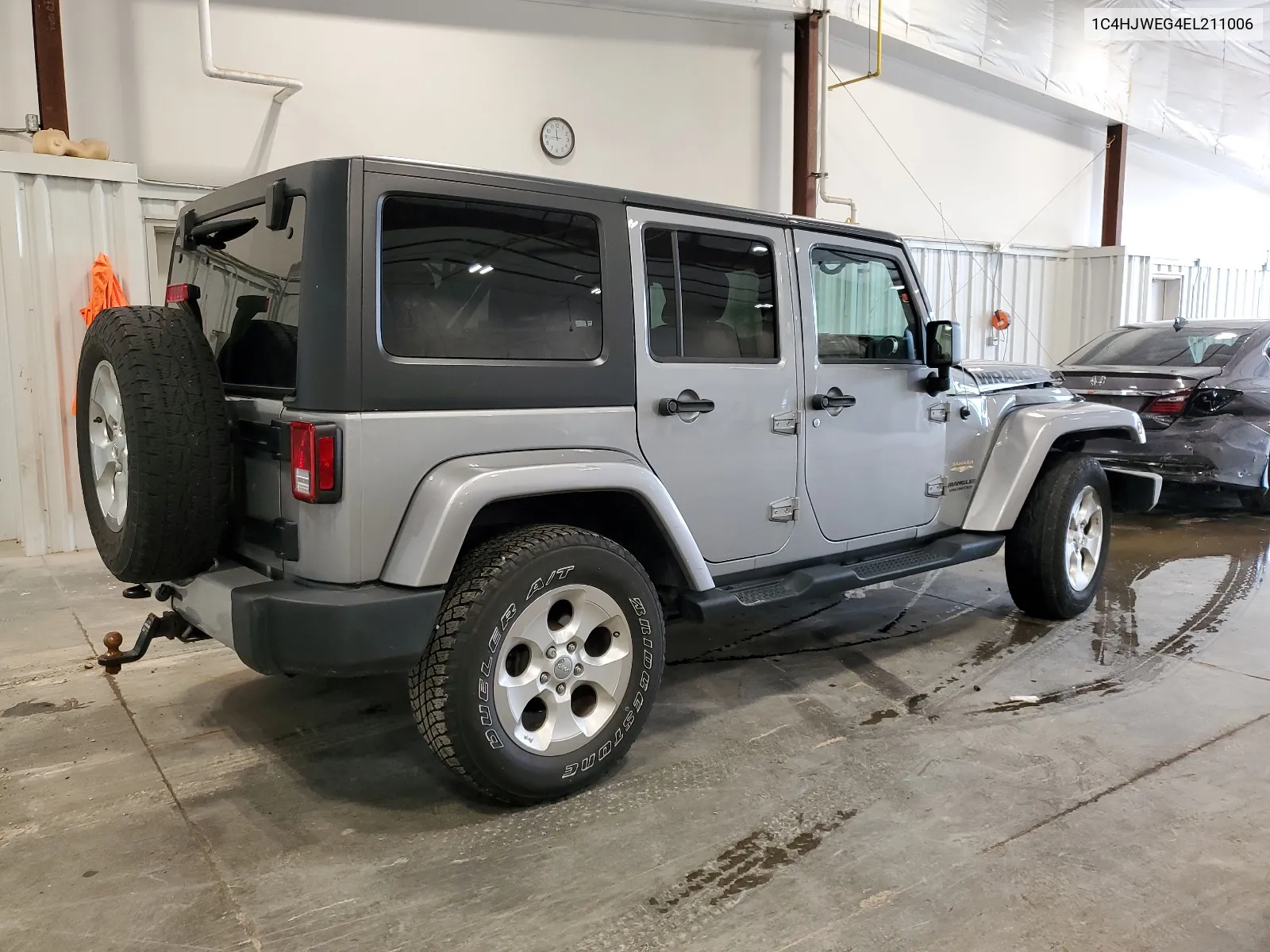 2014 Jeep Wrangler Unlimited Sahara VIN: 1C4HJWEG4EL211006 Lot: 66206124