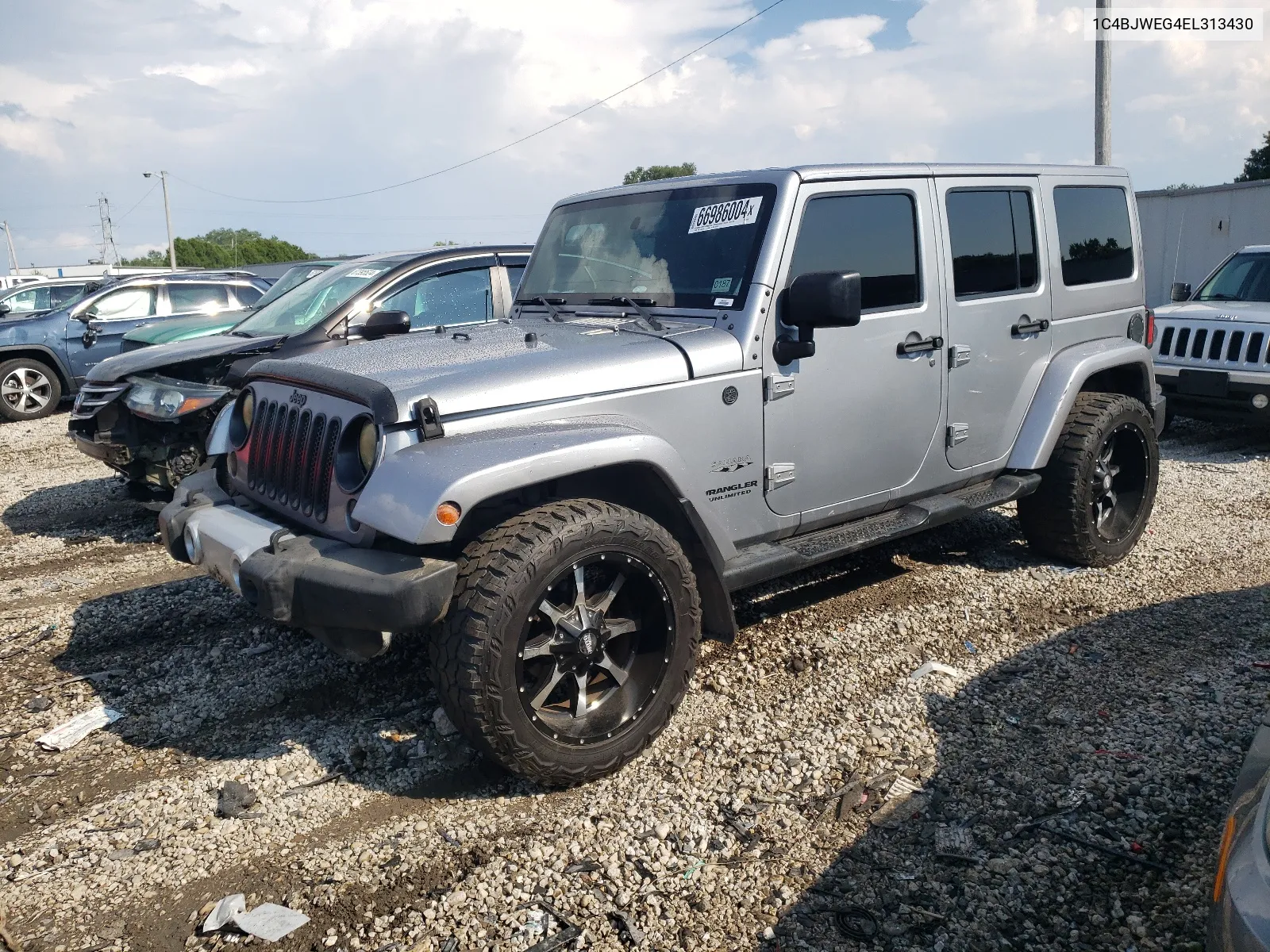 2014 Jeep Wrangler Unlimited Sahara VIN: 1C4BJWEG4EL313430 Lot: 66986004