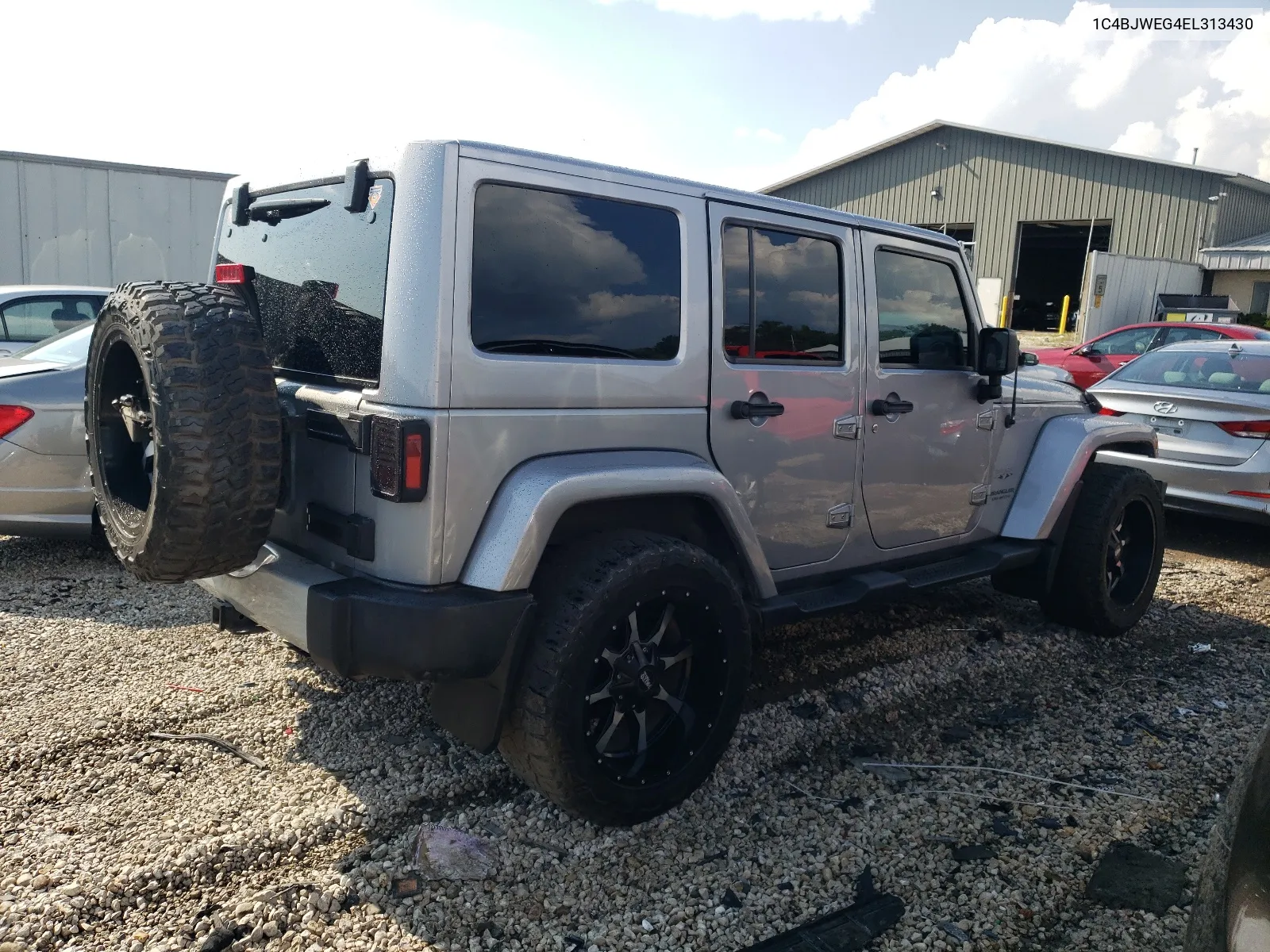 1C4BJWEG4EL313430 2014 Jeep Wrangler Unlimited Sahara