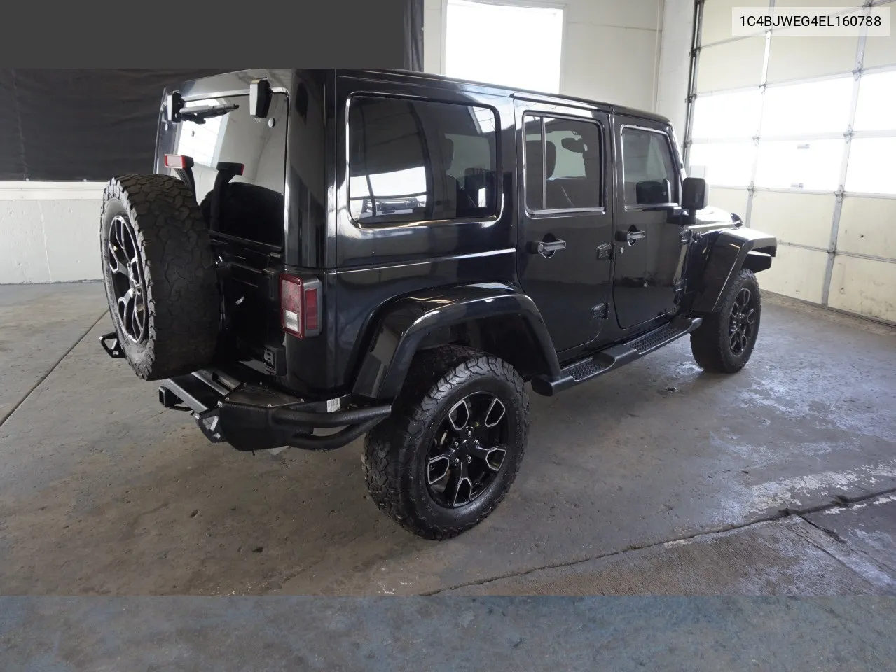 1C4BJWEG4EL160788 2014 Jeep Wrangler Unlimited Sahara