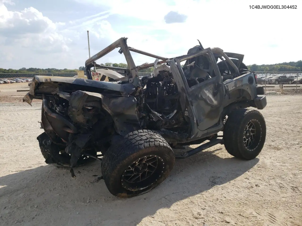 1C4BJWDG0EL304452 2014 Jeep Wrangler Unlimited Sport