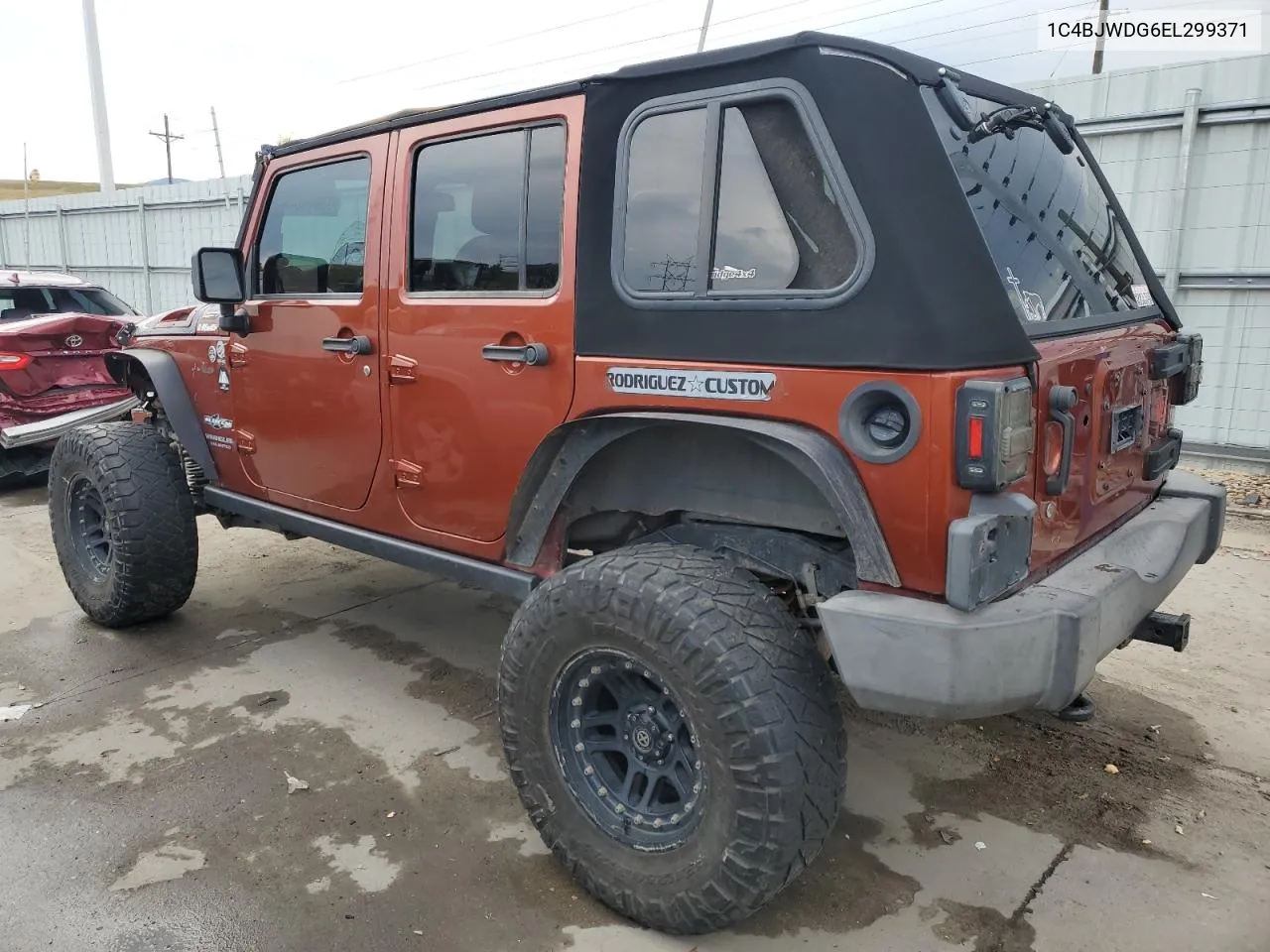 1C4BJWDG6EL299371 2014 Jeep Wrangler Unlimited Sport