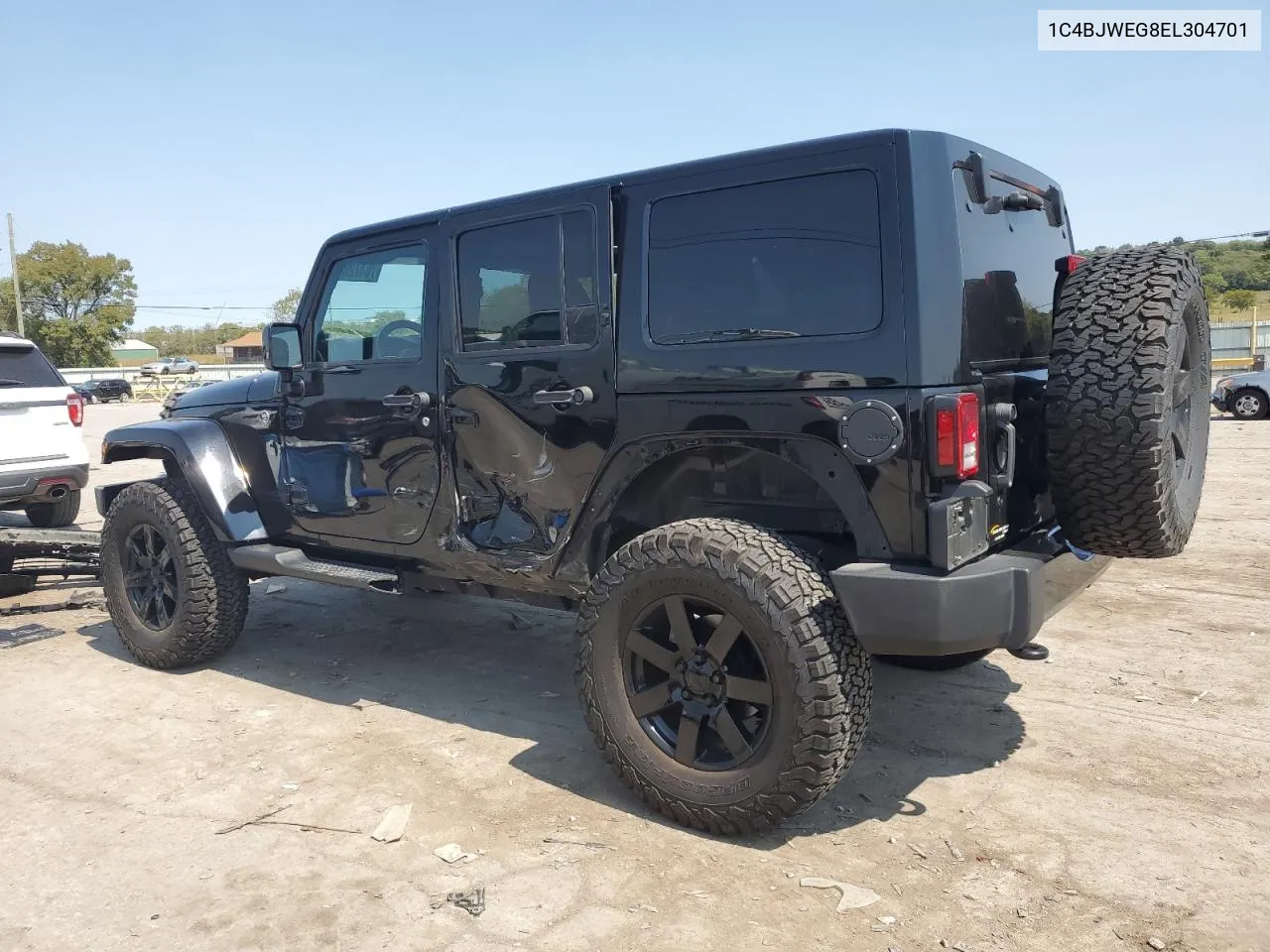 1C4BJWEG8EL304701 2014 Jeep Wrangler Unlimited Sahara