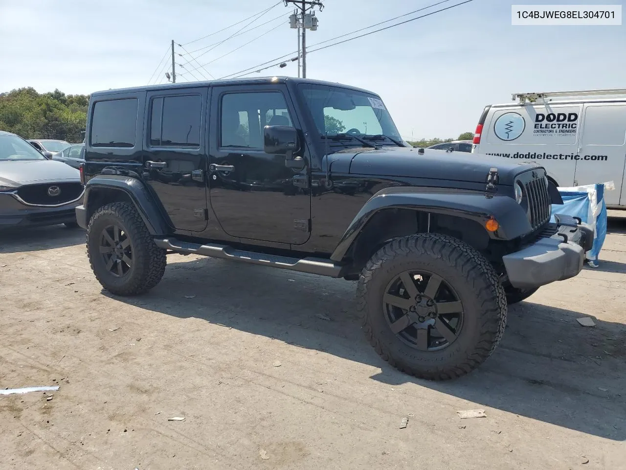 1C4BJWEG8EL304701 2014 Jeep Wrangler Unlimited Sahara