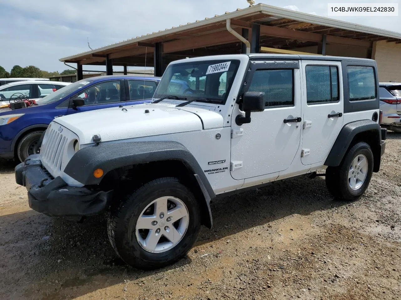 1C4BJWKG9EL242830 2014 Jeep Wrangler Unlimited Sport