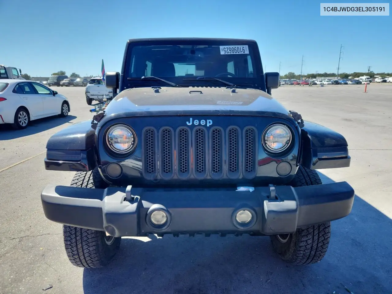 1C4BJWDG3EL305191 2014 Jeep Wrangler Unlimited Sport