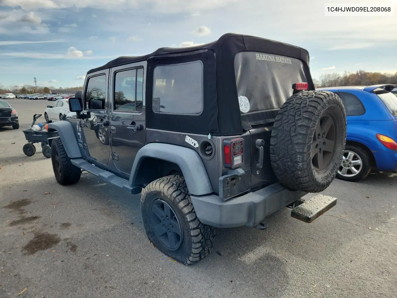 1C4HJWDG9EL208068 2014 Jeep Wrangler Unlimited Sport