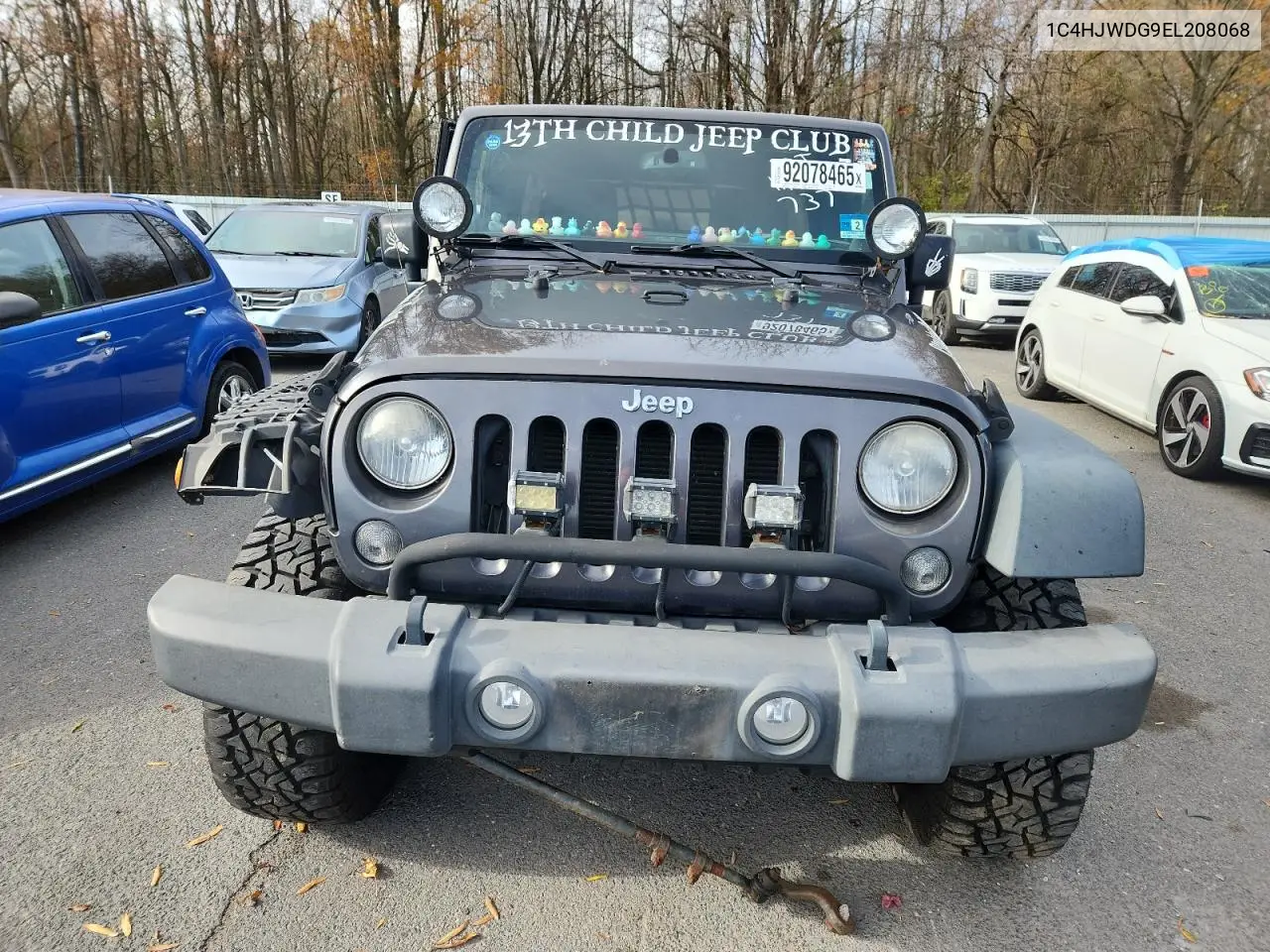 1C4HJWDG9EL208068 2014 Jeep Wrangler Unlimited Sport