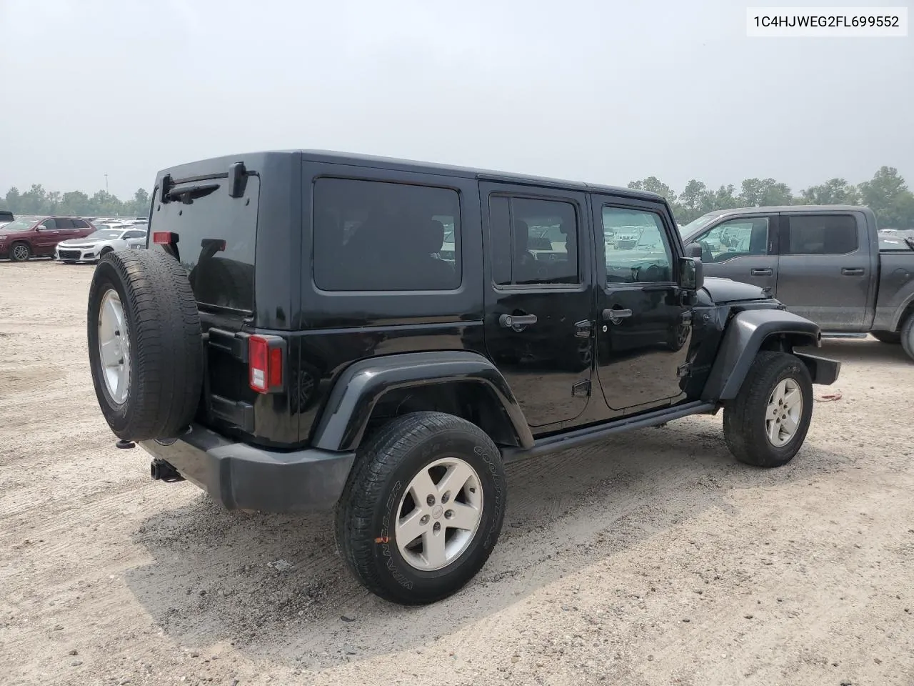 2015 Jeep Wrangler Unlimited Sahara VIN: 1C4HJWEG2FL699552 Lot: 54344614