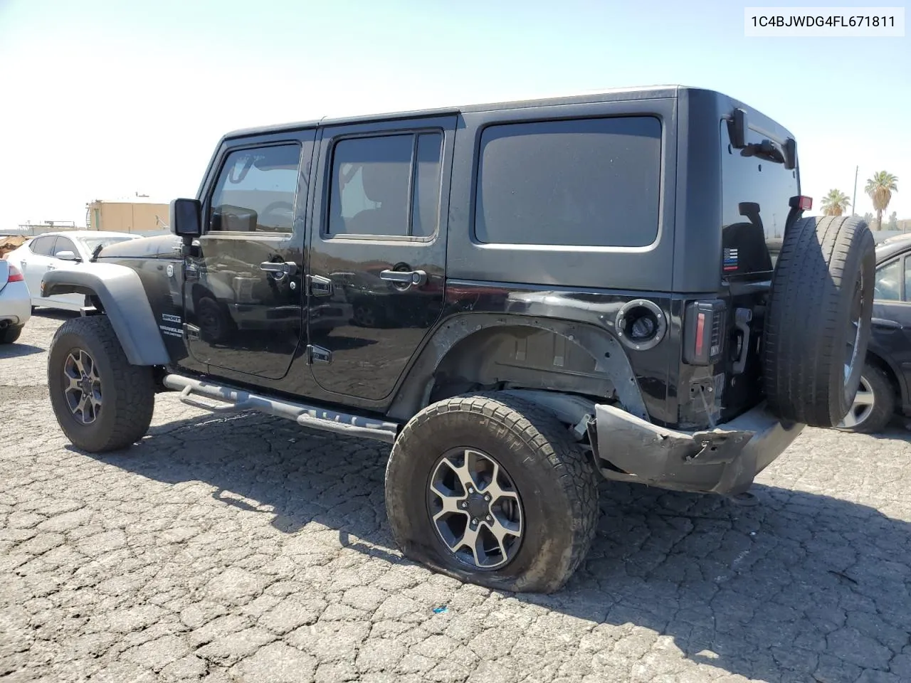 1C4BJWDG4FL671811 2015 Jeep Wrangler Unlimited Sport