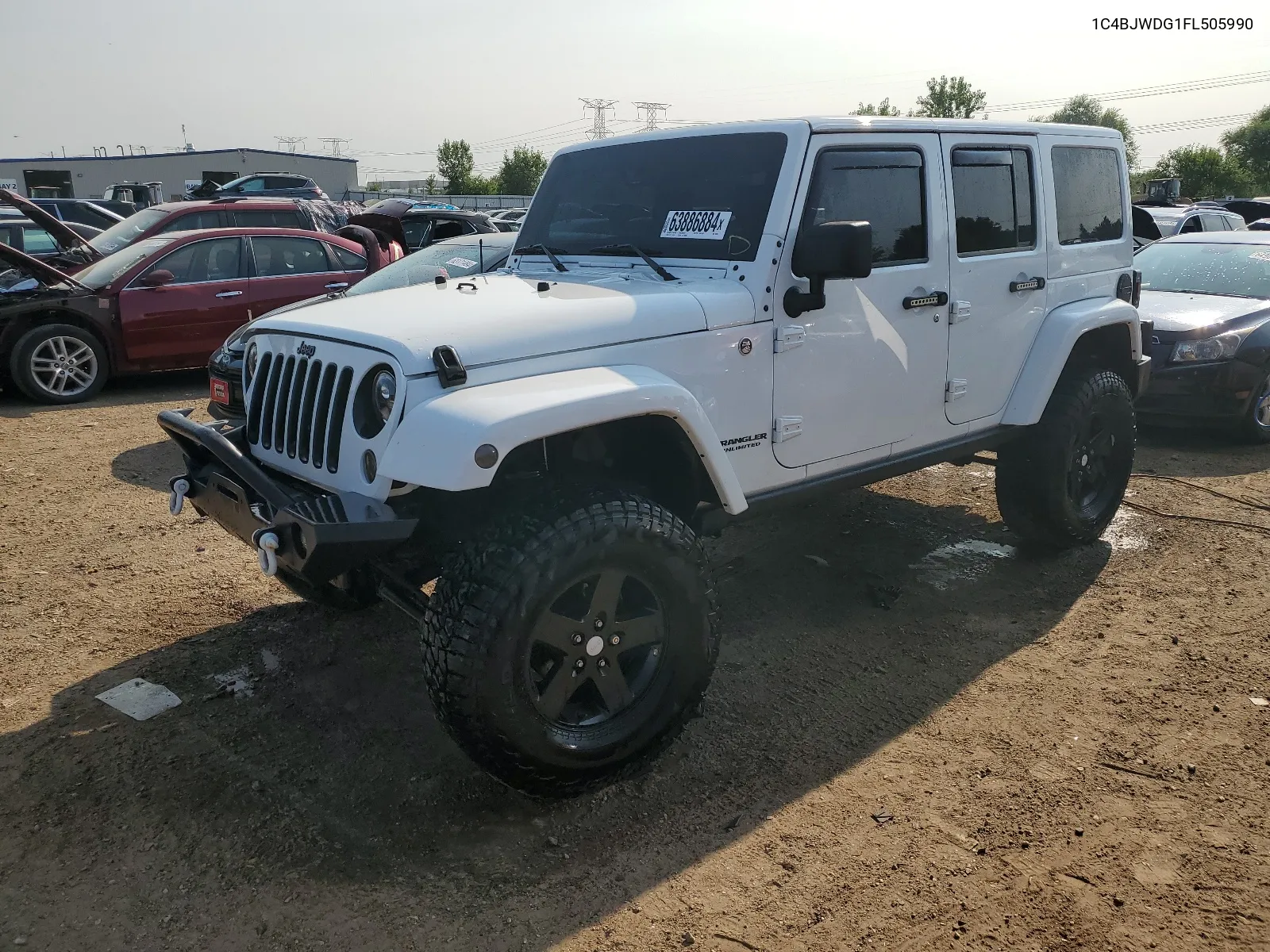 1C4BJWDG1FL505990 2015 Jeep Wrangler Unlimited Sport