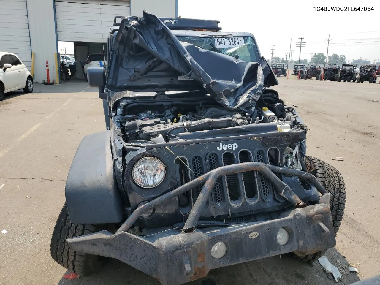 1C4BJWDG2FL647054 2015 Jeep Wrangler Unlimited Sport