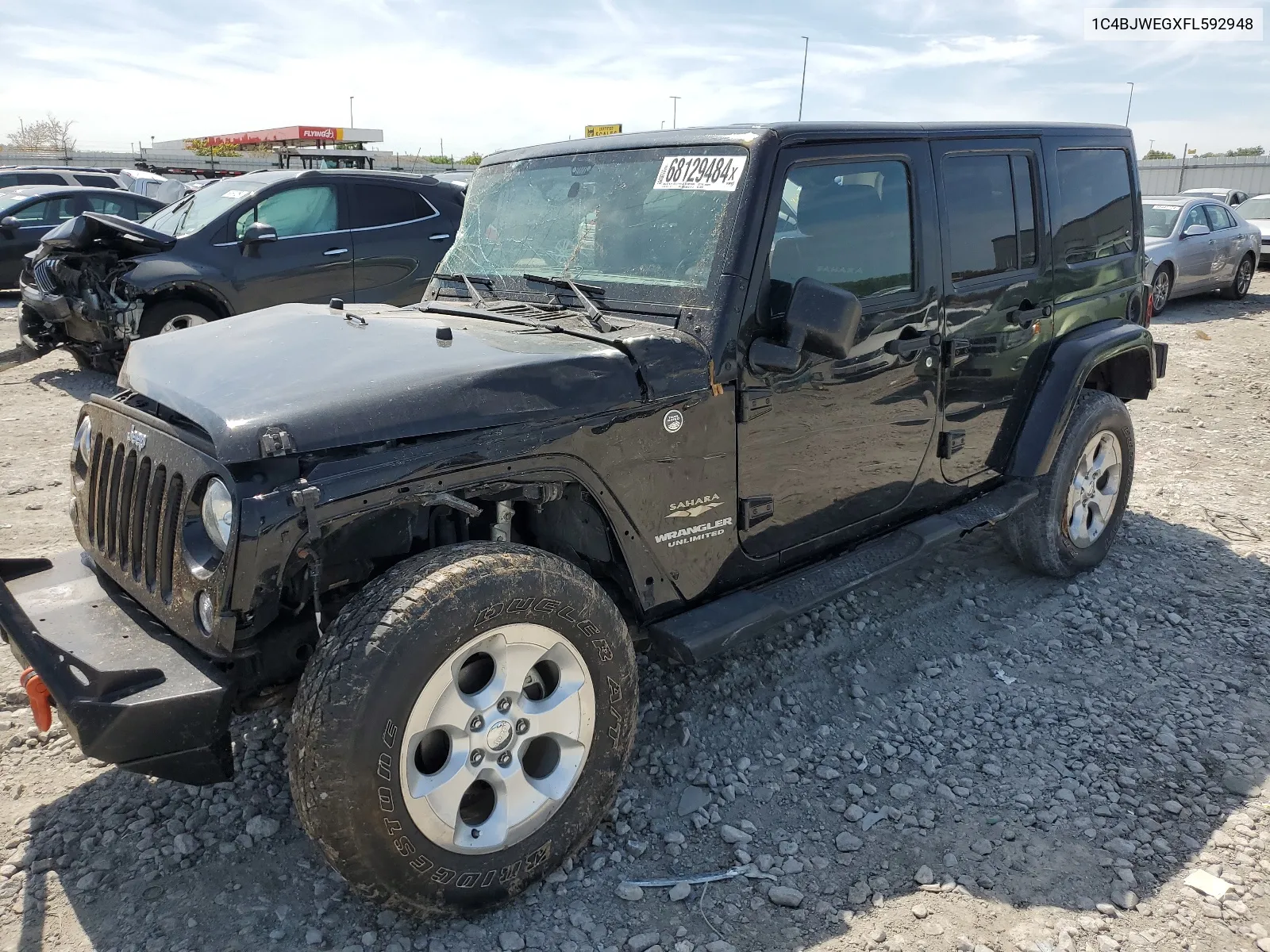 2015 Jeep Wrangler Unlimited Sahara VIN: 1C4BJWEGXFL592948 Lot: 68129484