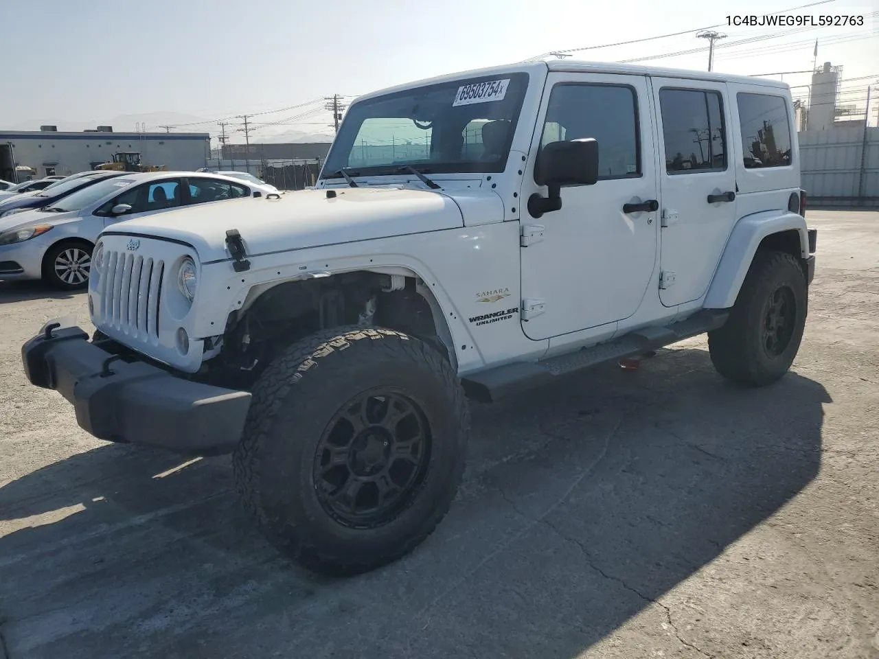 2015 Jeep Wrangler Unlimited Sahara VIN: 1C4BJWEG9FL592763 Lot: 69503754