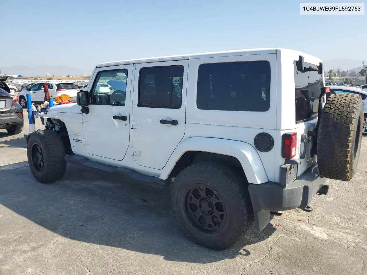 1C4BJWEG9FL592763 2015 Jeep Wrangler Unlimited Sahara