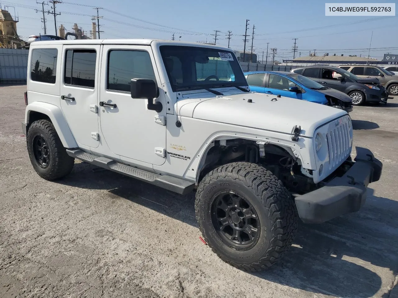 2015 Jeep Wrangler Unlimited Sahara VIN: 1C4BJWEG9FL592763 Lot: 69503754