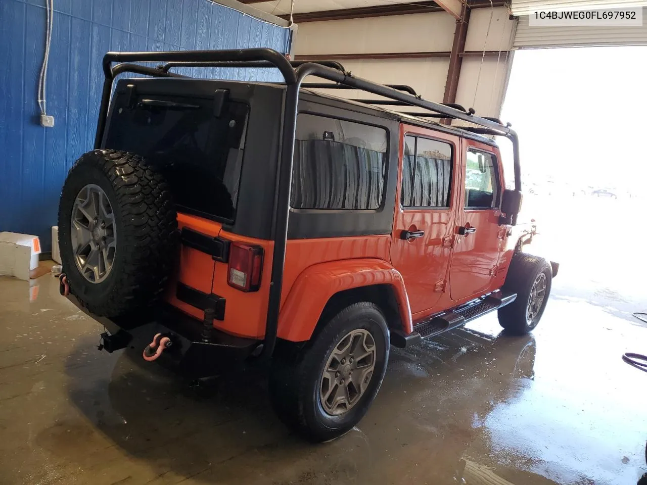 2015 Jeep Wrangler Unlimited Sahara VIN: 1C4BJWEG0FL697952 Lot: 71001664