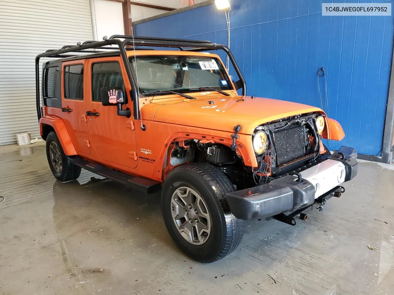 2015 Jeep Wrangler Unlimited Sahara VIN: 1C4BJWEG0FL697952 Lot: 71001664