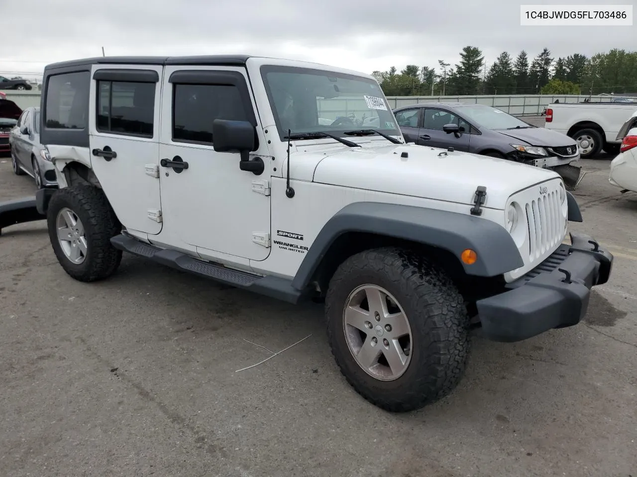 1C4BJWDG5FL703486 2015 Jeep Wrangler Unlimited Sport