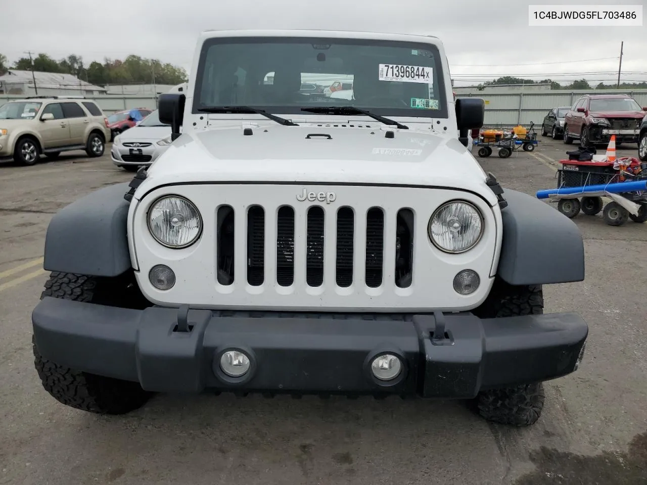 1C4BJWDG5FL703486 2015 Jeep Wrangler Unlimited Sport