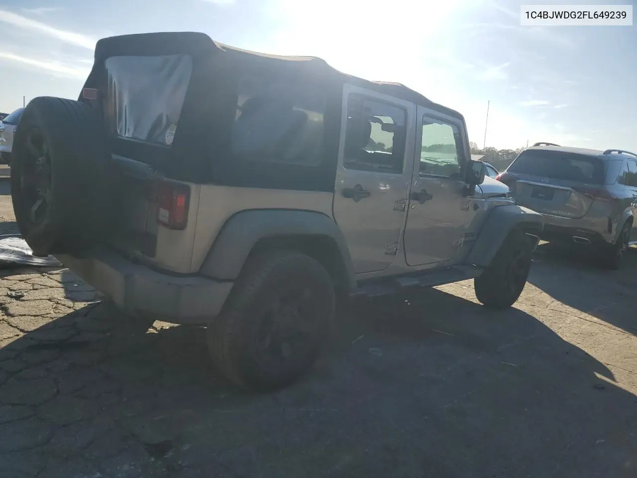 1C4BJWDG2FL649239 2015 Jeep Wrangler Unlimited Sport