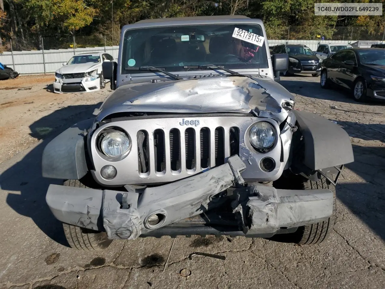1C4BJWDG2FL649239 2015 Jeep Wrangler Unlimited Sport