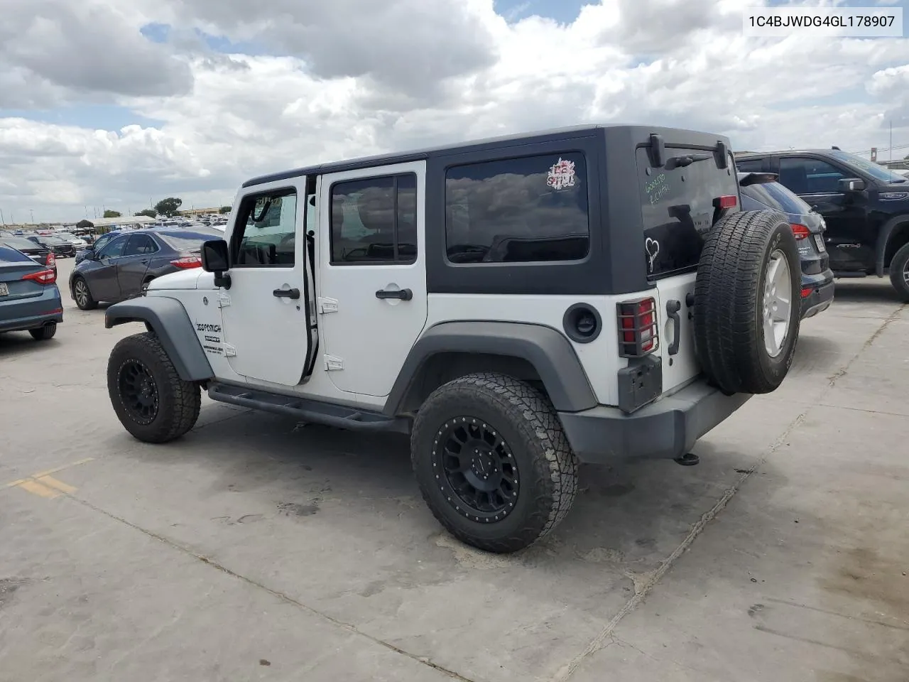 1C4BJWDG4GL178907 2016 Jeep Wrangler Unlimited Sport