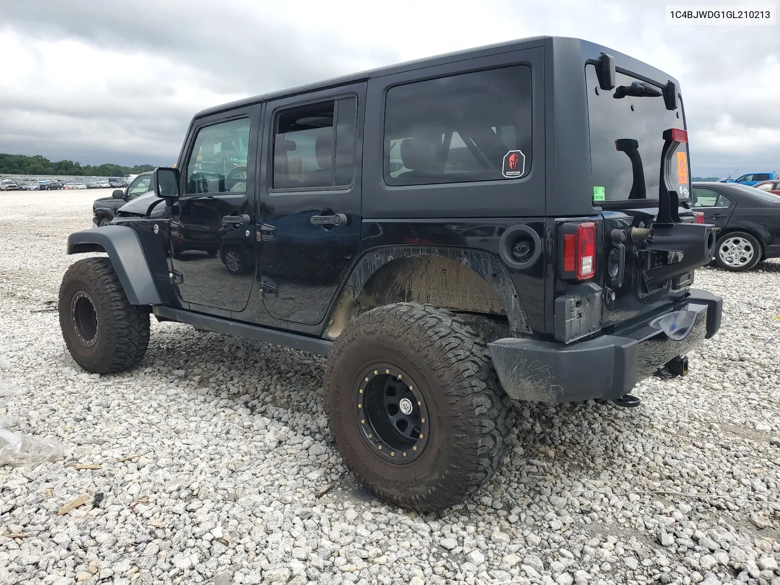 2016 Jeep Wrangler Unlimited Sport VIN: 1C4BJWDG1GL210213 Lot: 65350894