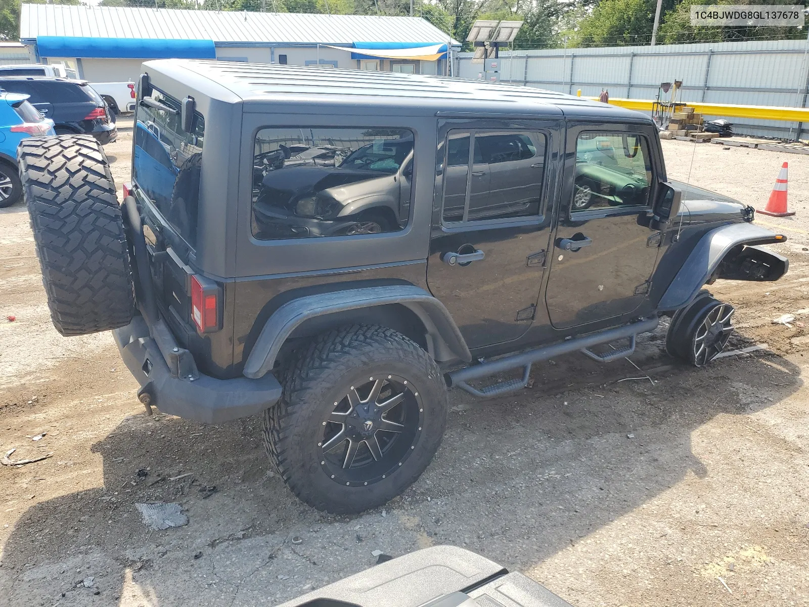 1C4BJWDG8GL137678 2016 Jeep Wrangler Unlimited Sport