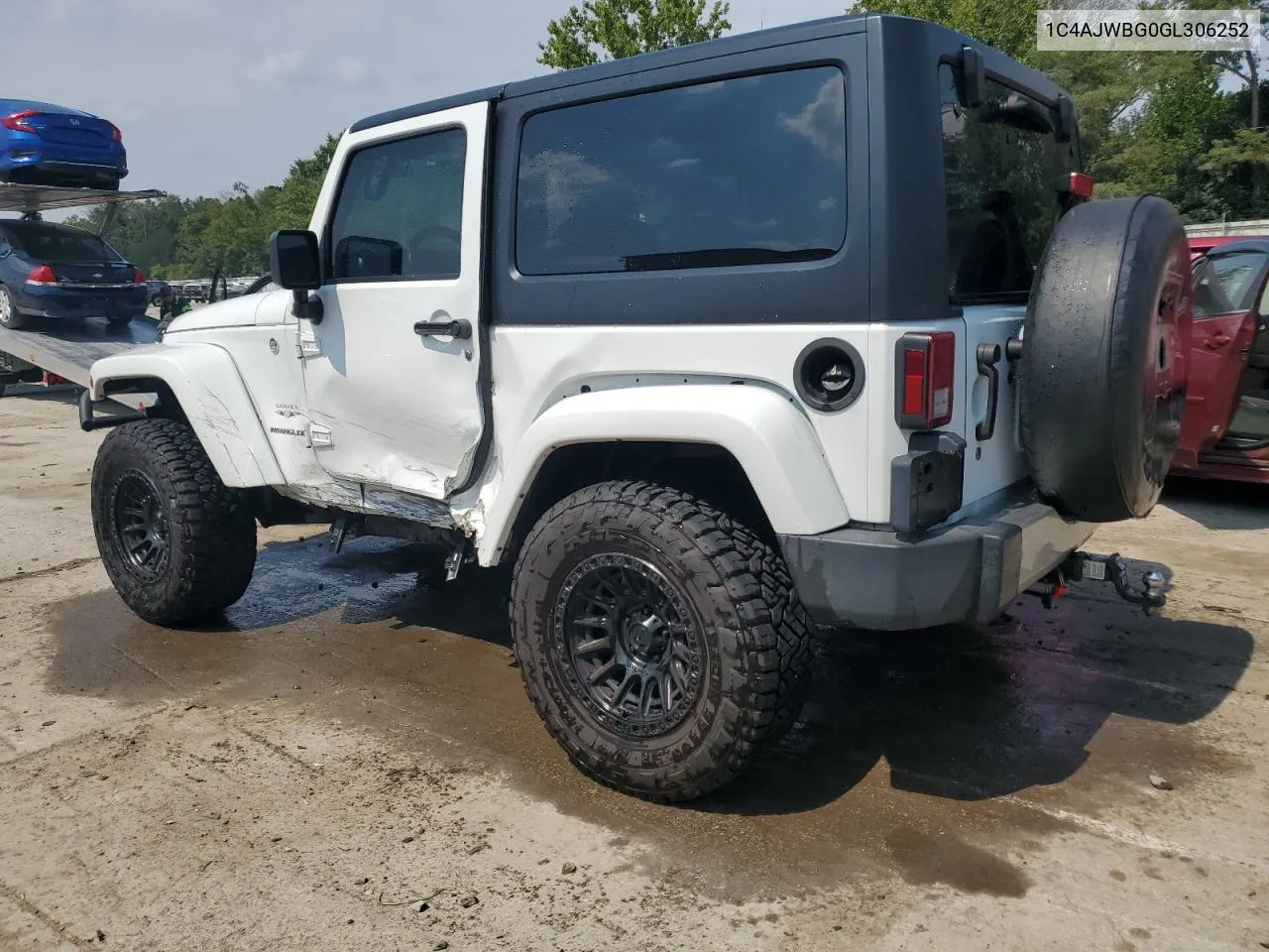 2016 Jeep Wrangler Sahara VIN: 1C4AJWBG0GL306252 Lot: 69059524