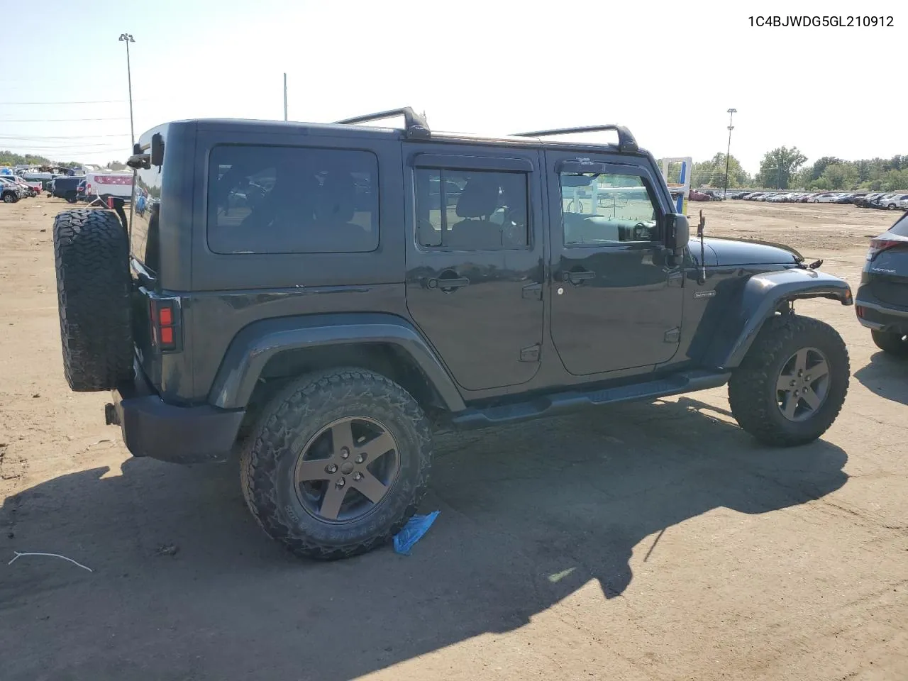 2016 Jeep Wrangler Unlimited Sport VIN: 1C4BJWDG5GL210912 Lot: 71577264