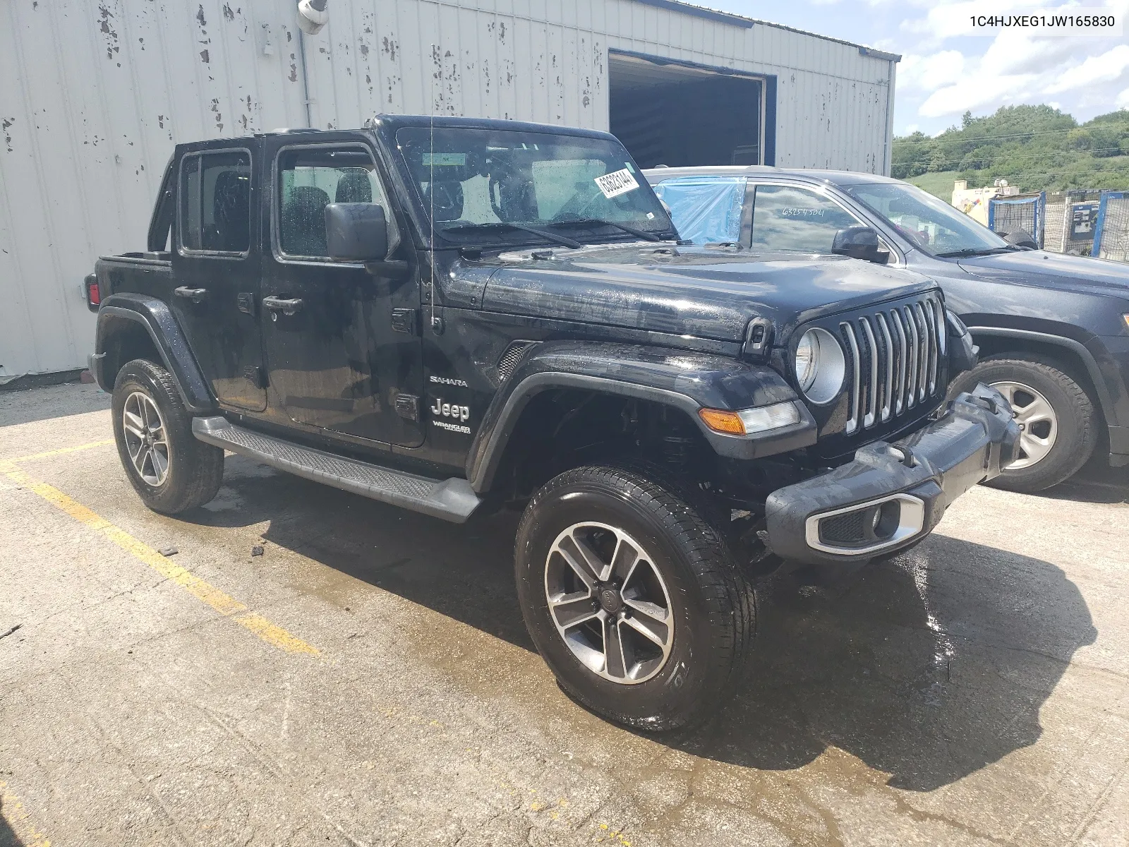 2018 Jeep Wrangler Unlimited Sahara VIN: 1C4HJXEG1JW165830 Lot: 63623144