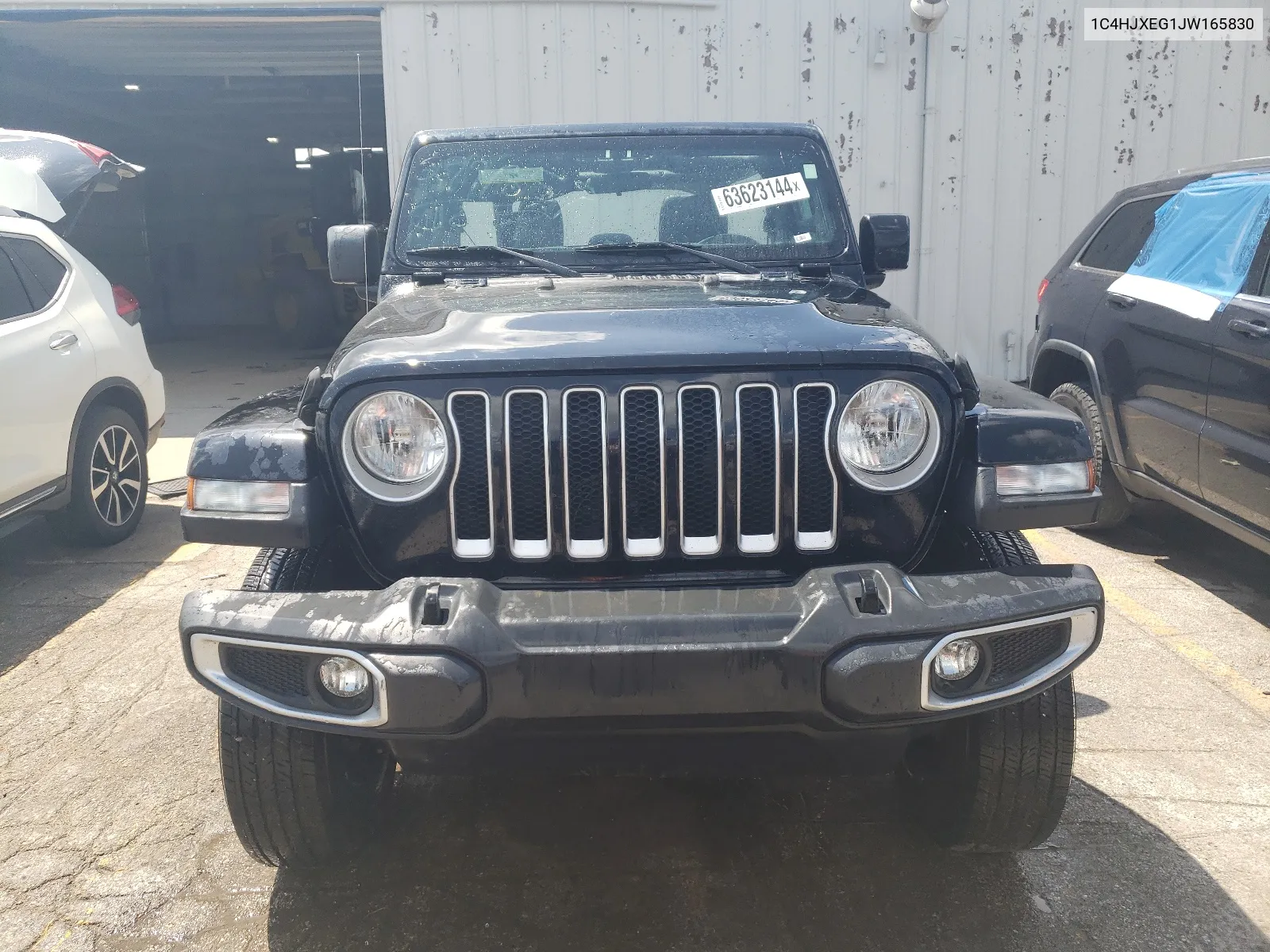 2018 Jeep Wrangler Unlimited Sahara VIN: 1C4HJXEG1JW165830 Lot: 63623144