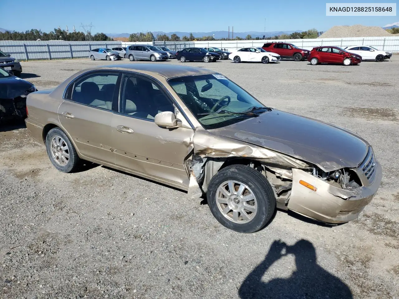 KNAGD128825158648 2002 Kia Optima Magentis