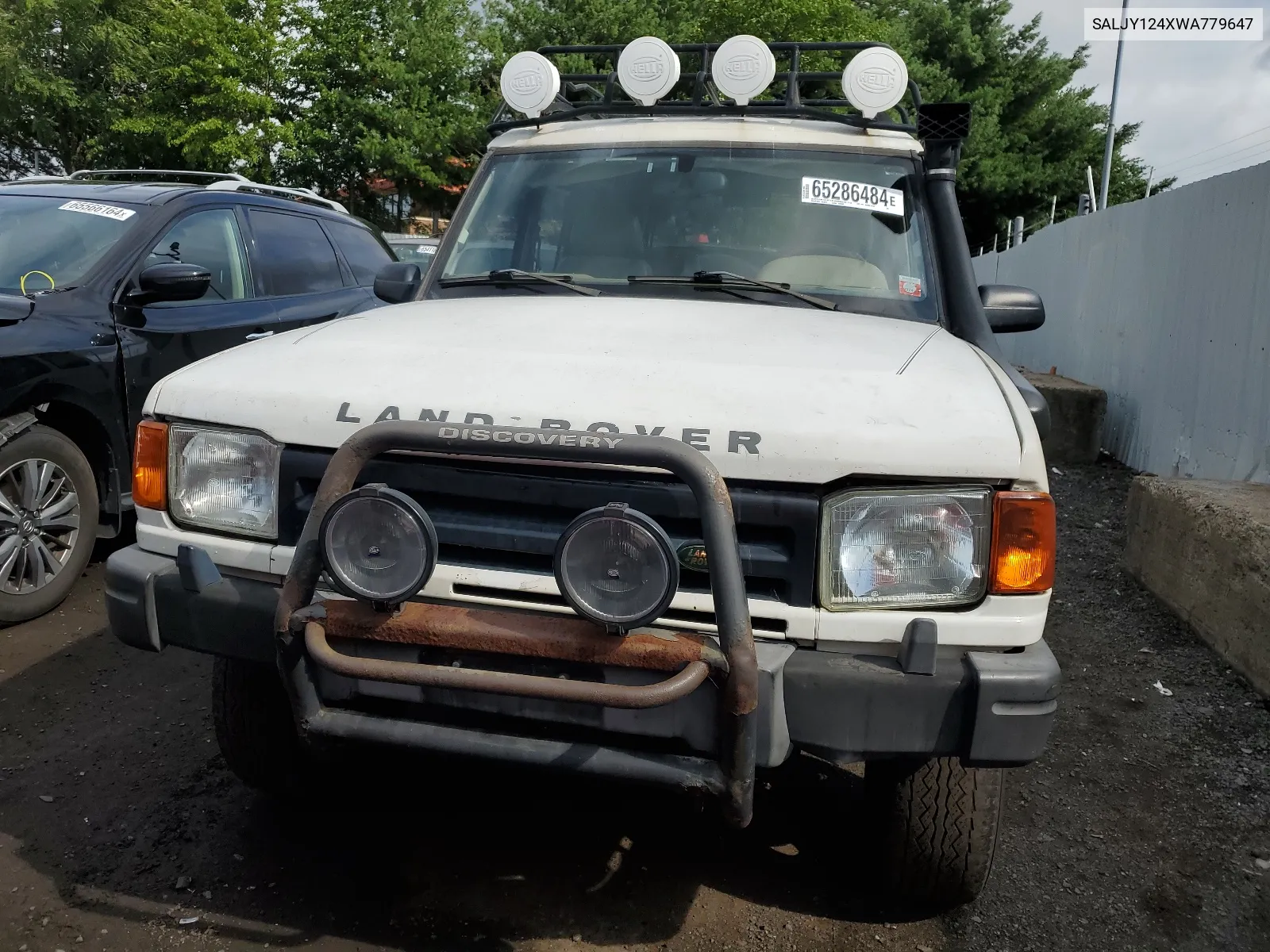 1998 Land Rover Discovery VIN: SALJY124XWA779647 Lot: 65286484