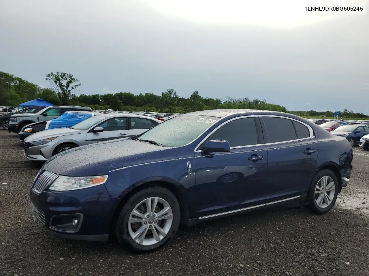 2011 Lincoln Mks VIN: 1LNHL9DR0BG605245 Lot: 55860194