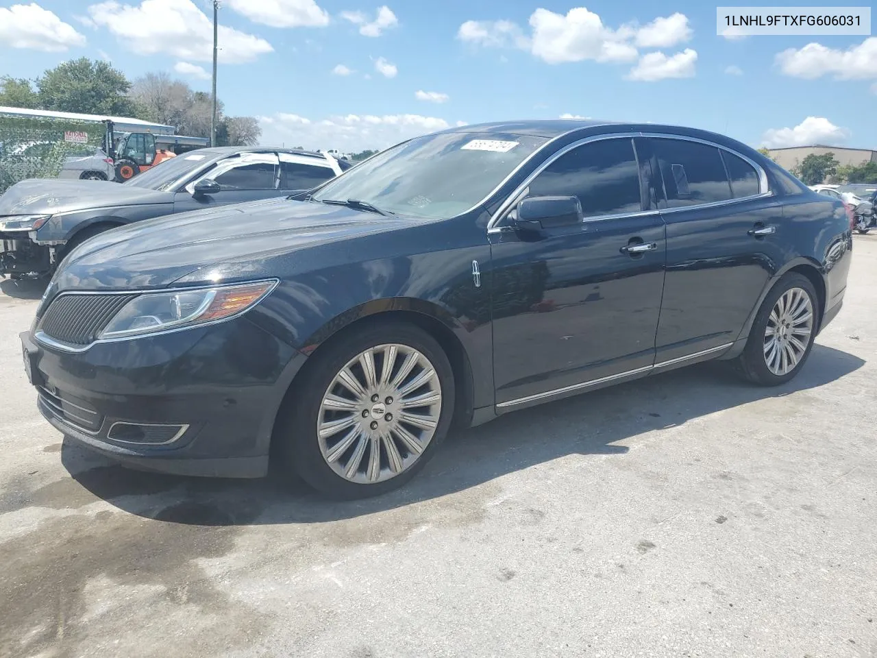 2015 Lincoln Mks VIN: 1LNHL9FTXFG606031 Lot: 55574704