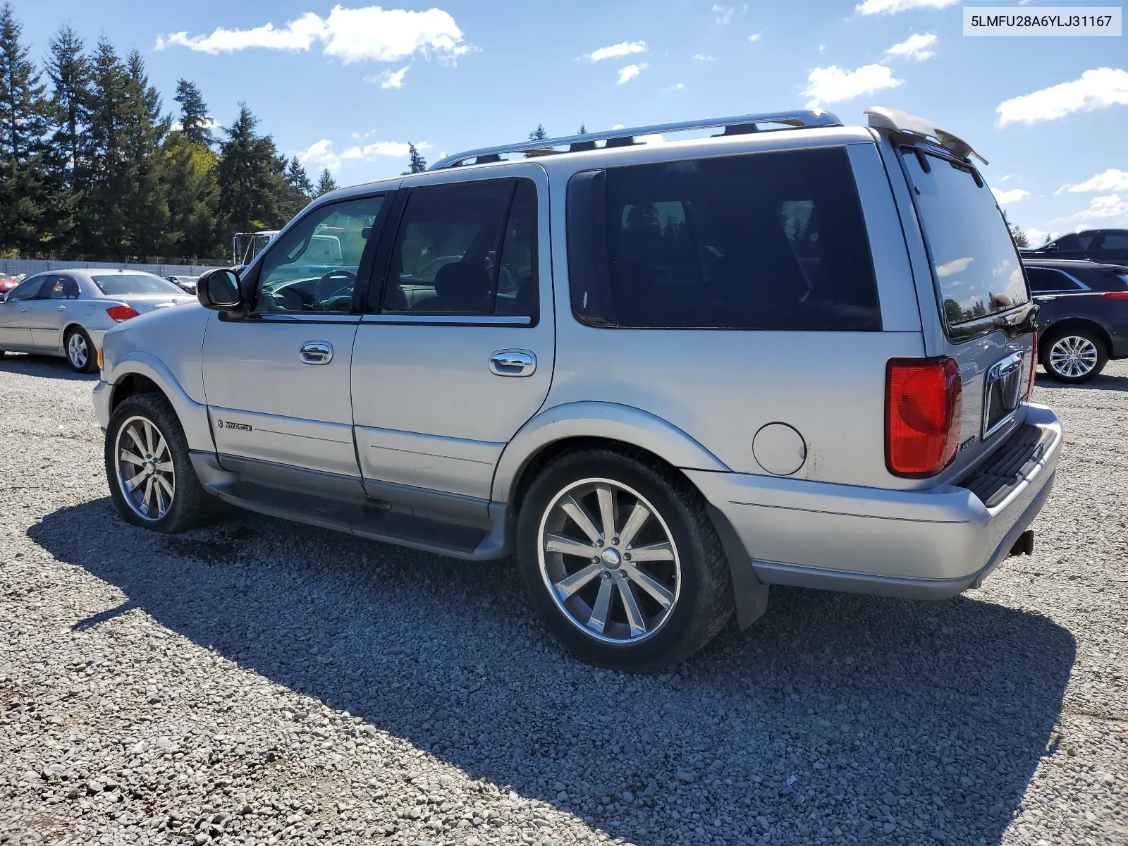 2000 Lincoln Navigator VIN: 5LMFU28A6YLJ31167 Lot: 53550954