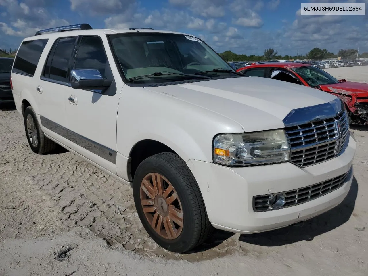 2013 Lincoln Navigator L VIN: 5LMJJ3H59DEL02584 Lot: 57879094