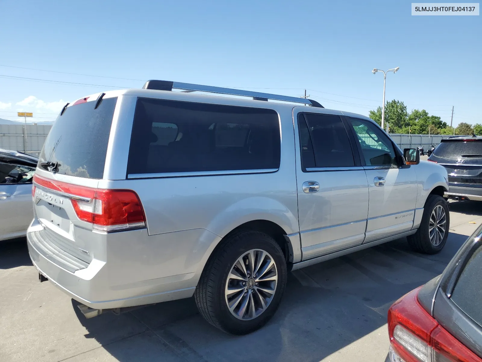 2015 Lincoln Navigator L VIN: 5LMJJ3HT0FEJ04137 Lot: 57914254